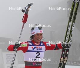 26.02.2011, Oslo, Norway (NOR): Marit Bjoergen (NOR), Fischer, Rottefella, Swix  - FIS nordic world ski championships, cross-country, pursuit women, Oslo (NOR). www.nordicfocus.com. © Hemmersbach/NordicFocus. Every downloaded picture is fee-liable.