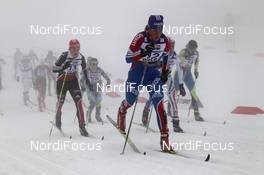 26.02.2011, Oslo, Norway (NOR): group, in front Yulia Tchekaleva (RUS), Fischer, Alpina, Rottefella, Adidas, Swix, behind Katrin Zeller (GER), Rossignol, Rottefella, One Way, adidas  - FIS nordic world ski championships, cross-country, pursuit women, Oslo (NOR). www.nordicfocus.com. © Hemmersbach/NordicFocus. Every downloaded picture is fee-liable.