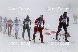 26.02.2011, Oslo, Norway (NOR): in front, l-r: Marit Bjoergen (NOR), Fischer, Rottefella, Swix, Justyna Kowalczyk (POL), Fischer, Salomon, Swix, behind Aino Kaisa Saarinen (FIN), Rossignol, Rottefella, Alpina, One Way, Craft  - FIS nordic world ski championships, cross-country, pursuit women, Oslo (NOR). www.nordicfocus.com. © Hemmersbach/NordicFocus. Every downloaded picture is fee-liable.