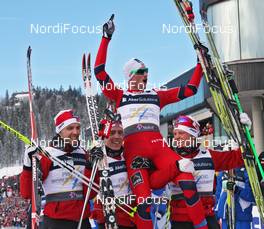 04.03.2011, Oslo, Norway (NOR): l-r: Tord Asle Gjerdalen (NOR), Atomic, Salomon, One Way, Swix, Eldar Roenning (NOR), Rossignol, Rottefella, Swix, Petter Northug (NOR), Fischer, Rottefella, Alpina, Ski Go, Swix, Martin Johnsrud Sundby (NOR), Fischer, Rottefella, Alpina, Swix  - FIS nordic world ski championships, cross-country, 4x10km men, Oslo (NOR). www.nordicfocus.com. © Hemmersbach/NordicFocus. Every downloaded picture is fee-liable.
