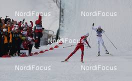 04.03.2011, Oslo, Norway (NOR): l-r: Petter Northug (NOR), Fischer, Rottefella, Alpina, Ski Go, Swix and Marcus Hellner (SWE), Fischer, Salomon, Exel, Craft  - FIS nordic world ski championships, cross-country, 4x10km men, Oslo (NOR). www.nordicfocus.com. © Hemmersbach/NordicFocus. Every downloaded picture is fee-liable.