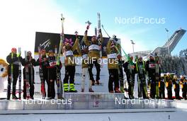 04.03.2011, Oslo, Norway (NOR): teams on the podium (l-r) Germany, Norway and Sweden  - FIS nordic world ski championships, cross-country, 4x10km men, Oslo (NOR). www.nordicfocus.com. © Laiho/NordicFocus. Every downloaded picture is fee-liable.