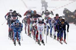 04.03.2011, Oslo, Norway (NOR): start, in front, l-r: Jean Marc Gaillard (FRA), Fischer, Rottefella, Swix, One Way, Daniel Rickardsson (SWE), Fischer, Salomon, Swix, Ville Nousiainen (FIN), Peltonen, Rottefella, Alpina  - FIS nordic world ski championships, cross-country, 4x10km men, Oslo (NOR). www.nordicfocus.com. © Hemmersbach/NordicFocus. Every downloaded picture is fee-liable.