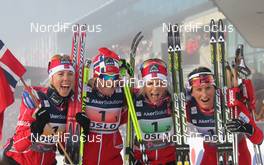 03.03.2011, Oslo, Norway (NOR): World Champion Team Norway, l-r: Kristin Stoermer Steira (NOR), Madshus, Salomon, One Way, Swix, Vibeke W. Skofterud (NOR), Fischer, Rottefella, Alpina, One Way, Swix, Therese Johaug (NOR), Fischer, Salomon, Swix, Marit Bjoergen (NOR), Fischer, Rottefella, Swix  - FIS nordic world ski championships, cross-country, 4x5km women, Oslo (NOR). www.nordicfocus.com. © Hemmersbach/NordicFocus. Every downloaded picture is fee-liable.