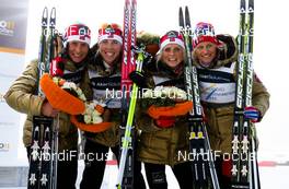 03.03.2011, Oslo, Norway (NOR): (l-r) Marit Bjoergen (NOR), Fischer, Swix, Rottefella, Kristin Steira (NOR), Madshus, One Way, Salomon, Therese Johaug (NOR), Fischer, Swix, Salomon and Vibeke Skofterud (NOR), Fischer, One Way, Alpina, Rottefella  - FIS nordic world ski championships, cross-country, 4x5km women, Oslo (NOR). www.nordicfocus.com. © Laiho/NordicFocus. Every downloaded picture is fee-liable.