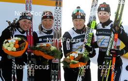 03.03.2011, Oslo, Norway (NOR):  (l-r) Krista Laehteenmaeki (FIN), Madshus, Rottefella, Craft, Riitta-Liisa Roponen (FIN), Atomic, Leki, Salomon, Craft, Aino-Kaisa Saarinen (FIN), Rossignol, One Way, Alpina, Rottefelle, Craft and Pirjo Muranen (FIN), Fischer, Rottefella, Exel - FIS nordic world ski championships, cross-country, 4x5km women, Oslo (NOR). www.nordicfocus.com. © Laiho/NordicFocus. Every downloaded picture is fee-liable.