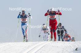 03.03.2011, Oslo, Norway (NOR): (r-l) Vibeke Skofterud (NOR), Fischer, One Way, Alpina, Rottefella leading on the first leg together with Marianna Longa (ITA), Fischer, One Way, Salomon  - FIS nordic world ski championships, cross-country, 4x5km women, Oslo (NOR). www.nordicfocus.com. © Laiho/NordicFocus. Every downloaded picture is fee-liable.