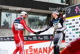 23.02.2011, Oslo, Norway (NOR):  (l-r) Asger Fischer Moelgaard (DAN) congratulates the winner Benjamin Koons (NZE) - FIS nordic world ski championships, cross-country, Individual Classic Qualification Race, Oslo (NOR). www.nordicfocus.com. © Laiho/NordicFocus. Every downloaded picture is fee-liable.