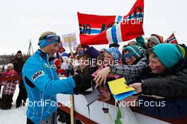 06.04.2011, Tana, Norway (NOR):  Kristin Steira (NOR), Madshus, One Way, Salomon giving autograms to the school kids - Tour de Barents Kutsu 2011, women 6km , Tana (NOR). www.nordicfocus.com. © Laiho/NordicFocus. Every downloaded picture is fee-liable.