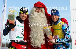 10.04.2011, Rovaniemi, Finland (FIN): (l-r) Maurice Manificat (FRA), Fischer, Swix, Rottefella, One Way, Santa Claus (FIN) and Jean Marc Gaillard (FRA), Fischer, Swix, Rottefella, One Way  - Tour de Barents 2011, Ounasvaara Climb Pursuit, Rovaniemi (FIN). www.nordicfocus.com. © Laiho/NordicFocus. Every downloaded picture is fee-liable.
