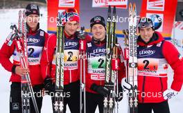 20.11.2011, Sjusjoen, Norway (NOR): the winner team (l-r) Lars Berger (NOR),Madshus, Swix, Salomon, Odlo, Petter Northug (NOR), Fischer, Swix, Alpina, Rottefella Finn Haagen Krogh (NOR), Fischer, Swix, Alpina, Rottefella and Eldar Roenning (NOR), Rossignol, Swix, Rottefella  - FIS world cup cross country, 4x10km men, Sjusjoen (NOR). www.nordicfocus.com. Â© Laiho/NordicFocus. Every downloaded picture is fee-liable.