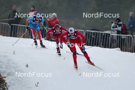 20.11.2011, Sjusjoen, Norway (NOR):  Petter Northug (NOR), Fischer, Swix, Alpina, Rottefella follwed by Sjur Roethe (NOR), Fischer, KV+, Swix, Salomon and Alexander Legkov (RUS), Rossignol, Swix, Rottefella, Adidas - FIS world cup cross country, 4x10km men, Sjusjoen (NOR). www.nordicfocus.com. Â© Laiho/NordicFocus. Every downloaded picture is fee-liable.