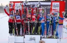 20.11.2011, Sjusjoen, Norway (NOR): teams on the podium (l-r) Norway II, Norway I and Finland  - FIS world cup cross country, 4x5km women, Sjusjoen (NOR). www.nordicfocus.com. Â© Laiho/NordicFocus. Every downloaded picture is fee-liable.