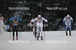 25.11.2011, Kuusamo, Finland (FIN): Dario Cologna (SUI), Fischer, Rottefella, Alpina, Swix, ODLO, Casco,  Jesper Modin (SWE), Fischer, Salomon, Swix, Craft, Kein Einaste (EST), Fischer, Rottefella, Swix- FIS world cup cross-country, individual sprint, Kuusamo (FIN). www.nordicfocus.com. © Manzoni/NordicFocus. Every downloaded picture is fee-liable.