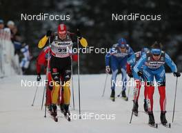 25.11.2011, Kuusamo, Finland (FIN): Axel Teichmann (GER), Madshus, Rottefella, Swix, adidas, Toko, Nikita Kriukov (RUS), Rossignol, Rottefella, Swix, adidas  - FIS world cup cross-country, individual sprint, Kuusamo (FIN). www.nordicfocus.com. © Manzoni/NordicFocus. Every downloaded picture is fee-liable.