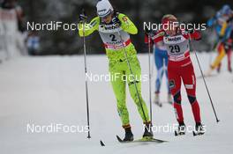 25.11.2011, Kuusamo, Finland (FIN): Katja Visnar (SLO), Fischer, Rottefella, Swix, Therese Johaug (NOR), Fischer, Salomon, Swix - FIS world cup cross-country, individual sprint, Kuusamo (FIN). www.nordicfocus.com. © Manzoni/NordicFocus. Every downloaded picture is fee-liable.