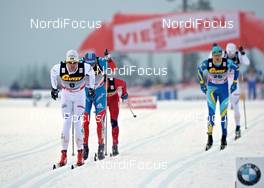 27.11.2011, Kuusamo, Finland (FIN): Johan Olsson (SWE), Fischer, Alpina, Swix, Craft, leading the chasing group - FIS world cup cross-country, pursuit men, Kuusamo (FIN). www.nordicfocus.com. © Felgenhauer/NordicFocus. Every downloaded picture is fee-liable.
