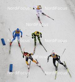 04.12.2011, Duesseldorf, Germany (GER): race scene, seen from Schlossturm, in front l-r: Lucia Anger (GER), Rossignol, Rottefella, Leki, Adidas and Kikkan Randall (USA), Fischer, Salomon, Swix  - FIS world cup cross-country, team sprint, Duesseldorf (GER). www.nordicfocus.com. © Hemmersbach/NordicFocus. Every downloaded picture is fee-liable.