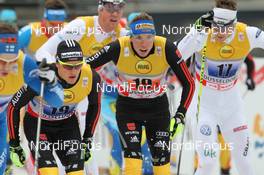 04.12.2011, Duesseldorf, Germany (GER): exchange of the German team, l-r: Sebastian Eisenlauer (GER), Fischer, Rottefella, One Way, Adidas and Tim Tscharnke (GER), Fischer, Alpina, Rottefella, Swix, Adidas  - FIS world cup cross-country, team sprint, Duesseldorf (GER). www.nordicfocus.com. © Hemmersbach/NordicFocus. Every downloaded picture is fee-liable.
