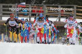 17.12.2011, Rogla, Slovenia (SLO): group, l-r: Jens Filbrich (GER), Rossignol, Rottefella, One Way, adidas, Ivan Babikov (CAN), Salomon, One Way, Devon Kershaw (CAN), Fischer, Salomon, Swix, One Way  - FIS world cup cross-country, mass men, Rogla (SLO). www.nordicfocus.com. © Hemmersbach/NordicFocus. Every downloaded picture is fee-liable.