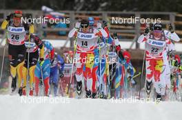 17.12.2011, Rogla, Slovenia (SLO): group, l-r: Jens Filbrich (GER), Rossignol, Rottefella, One Way, adidas, Ivan Babikov (CAN), Salomon, One Way, Devon Kershaw (CAN), Fischer, Salomon, Swix, One Way  - FIS world cup cross-country, mass men, Rogla (SLO). www.nordicfocus.com. © Hemmersbach/NordicFocus. Every downloaded picture is fee-liable.