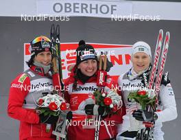 29.12.2011, Oberhof, Germany (GER): podium, l-r: Marit Bjoergen (NOR), Fischer, Rottefella, Swix, Justyna Kowalczyk (POL), Fischer, Rottefella, Swix, Hanna Brodin (SWE), Madshus, Craft, Rottefella, Casco  - FIS world cup cross-country, tour de ski, prologue women, Oberhof (GER). www.nordicfocus.com. © Hemmersbach/NordicFocus. Every downloaded picture is fee-liable.