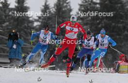 30.12.2011, Oberhof, Germany (GER): group, in front Petter Northug (NOR), Fischer, Rottefella, Alpina, Ski Go, Swix , behind l-r: Matti Heikkinen (FIN), Salomon, One Way, Michail Semenov (BLR), Atomic, Salomon, Swix, Giorgio di Centa (ITA), Fischer, Alpina, Rottefella, Swix, Rudy Project  - FIS world cup cross-country, tour de ski, pursuit men, Oberhof (GER). www.nordicfocus.com. © Hemmersbach/NordicFocus. Every downloaded picture is fee-liable.