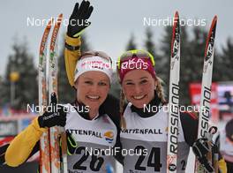 30.12.2011, Oberhof, Germany (GER): l-r: Katrin Zeller (GER), Rossignol, Rottefella, One Way, adidas and Stefanie Boehler (GER), Rossignol, Rottefella, Alpina, One Way, adidas  - FIS world cup cross-country, tour de ski, pursuit women handicap start, Oberhof (GER). www.nordicfocus.com. © Hemmersbach/NordicFocus. Every downloaded picture is fee-liable.