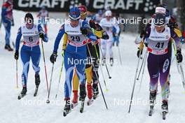 30.12.2011, Oberhof, Germany (GER): group, in front l-r: Riitta Liisa Roponen (FIN), Atomic, Salomon, Leki, Kerttu Niskanen (FIN), Fischer, Rotefella, Swix, Craft, Masako Ishida (JPN), Salomon, Swix  - FIS world cup cross-country, tour de ski, pursuit women handicap start, Oberhof (GER). www.nordicfocus.com. © Hemmersbach/NordicFocus. Every downloaded picture is fee-liable.