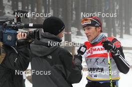 28.12.2011, Oberhof, Germany (GER): Jens Filbrich (GER), Rossignol, Rottefella, One Way, adidas gives interview to TV 2 Norway - FIS world cup cross-country, tour de ski, training, Oberhof (GER). www.nordicfocus.com. © Hemmersbach/NordicFocus. Every downloaded picture is fee-liable.