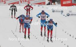 31.12.2011, Oberstdorf, Germany (GER): finish, in front l-r: Alexei Petukhov (RUS), Fischer, Fischer, Rottefella, Swix, Adidas, Nikita Kriukov (RUS), Rossignol, Rottefella, Swix, adidas, 2nd row l-r: Dimitri Japarov (RUS), Fischer, Rottefella, Alpina, Swix, Adidas, Nikolay Morilov (RUS), Madshus, Rottefella, adidas, Swix, 3rd row l-r: Dario Cologna (SUI), Fischer, Rottefella, Alpina, Swix, Odlo, Petter Northug (NOR), Fischer, Rottefella, Alpina, Ski Go, Swix    - FIS world cup cross-country, tour de ski, individual sprint, Oberstdorf (GER). www.nordicfocus.com. © Hemmersbach/NordicFocus. Every downloaded picture is fee-liable.