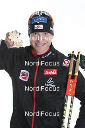04.03.2011, Oslo, Norway (NOR): Bernhard Gruber (AUT), Fischer, Rottefella, Loeffler, Leki  - FIS nordic world ski championships, nordic combined, medals, Oslo (NOR). www.nordicfocus.com. © Hemmersbach/NordicFocus. Every downloaded picture is fee-liable.
