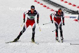 28.02.2011, Oslo, Norway (NOR): change-over, (l-r) Bernhard Gruber (AUT), Fischer, Rottefella, Loeffler and David Kreiner (AUT), Fischer, Swix, Loeffler  - FIS nordic world ski championships, nordic combined, team HS106/4x5km, Oslo (NOR). www.nordicfocus.com. © Laiho/NordicFocus. Every downloaded picture is fee-liable.
