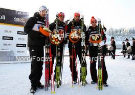 28.02.2011, Oslo, Norway (NOR): Second place, team Germany (l-r) Tino Edelmann (GER), Madshus, Leki, Rottefella, Adidas, Johannes Rydzek (GER), Fischer, Swix, Rottefella, Adidas, Bjoern Kircheisen (GER), Fischer, Leki, Rottefella, Adidas and Eric Frenzel (GER), Fischer, Leki, Salomon, Adidas  - FIS nordic world ski championships, nordic combined, team HS106/4x5km, Oslo (NOR). www.nordicfocus.com. © Laiho/NordicFocus. Every downloaded picture is fee-liable.