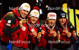 28.02.2011, Oslo, Norway (NOR): team Austria (l-r) Felix Gottwald (AUT), Fischer, Swix, Loeffler, David Kreiner (AUT), Fischer, Swix, Loeffler, Mario Stecher (AUT), Fischer, Leki, Rottefella, Loeffler and Bernhard Gruber (AUT), Fischer, Rottefella, Loeffler  - FIS nordic world ski championships, nordic combined, team HS106/4x5km, Oslo (NOR). www.nordicfocus.com. © Laiho/NordicFocus. Every downloaded picture is fee-liable.
