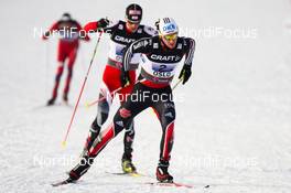28.02.2011, Oslo, Norway (NOR):  Tino Edelmann (GER), Madshus, Leki, Rottefella, Adidas followed by Mario Stecher (AUT), Fischer, Leki, Rottefella, Loeffler - FIS nordic world ski championships, nordic combined, team HS106/4x5km, Oslo (NOR). www.nordicfocus.com. © Laiho/NordicFocus. Every downloaded picture is fee-liable.