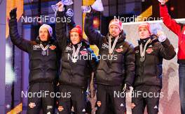 28.02.2011, Oslo, Norway (NOR): (l-r, Tino Edelmann (GER), Madshus, Leki, Rottefella, Adidas, Eric Frenzel (GER), Fischer, Leki, Salomon, Adidas, Bjoern Kircheisen (GER), Fischer, Leki, Rottefella, Adidas and Johannes Rydzek (GER), Fischer, Swix, Rottefella, Adidas  - FIS nordic world ski championships, nordic combined, team HS106/4x5km, Oslo (NOR). www.nordicfocus.com. © Laiho/NordicFocus. Every downloaded picture is fee-liable.