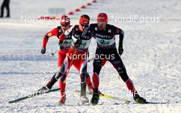 04.03.2011, Oslo, Norway (NOR): Bjoern Kircheisen (GER), Fischer, Leki, Rottefella, Adidas followed by David Kreiner (AUT), Fischer, Swix, Loeffler and Haavard Klemetsen (NOR), Fischer, Swix - FIS nordic world ski championships, nordic combined, team HS134/4x5km, Oslo (NOR). www.nordicfocus.com. © Laiho/NordicFocus. Every downloaded picture is fee-liable.
