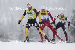 03.12.2011, Lillehammer, Norway (NOR):  Tino Edelmann (GER), Madshus, Leki, Rottefella, Adidas followed by Haavard Klemetsen (NOR), Fischer, Swix and Christoph Bieler (AUT) - FIS world cup nordic combined, individual gundersen HS100/10km, Lillehammer (NOR). www.nordicfocus.com. Â© Laiho/NordicFocus. Every downloaded picture is fee-liable.