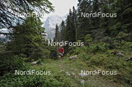 06.07.2011, Ehrwald, Austria (AUT): an athlete in the forest around Ehrwald - Salomon 4 Trails, trail running, 38km , Garmisch-Partenkirchen (GER) - Ehrwald (AUT). www.nordicfocus.com. © NordicFocus. Every downloaded picture is fee-liable.