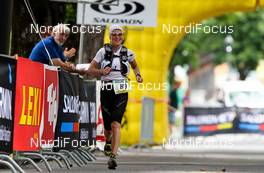 06.07.2011, Ehrwald, Austria (AUT): The winner of the womenÂ´s category Gaby Steigmeier (SUI)  - Salomon 4 Trails, trail running, 38km, Garmisch-Partenkirchen (GER) - Ehrwald (AUT). www.nordicfocus.com. Â© NordicFocus. Every downloaded picture is fee-liable.