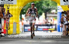 06.07.2011, Ehrwald, Austria (AUT): The winner of the first stage, Tom Owens (SCO)  - Salomon 4 Trails, trail running, 38km, Garmisch-Partenkirchen (GER) - Ehrwald (AUT). www.nordicfocus.com. Â© NordicFocus. Every downloaded picture is fee-liable.