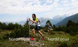 07.07.2011, Ehrwald, Austria (AUT): Matthias Dippacher (GER) followed by Thomas Miksch (GER)  - Salomon 4 Trails, trail running, 43km, Ehrwald (AUT) - Imst (AUT). www.nordicfocus.com. Â© NordicFocus. Every downloaded picture is fee-liable.