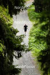08.07.2011, Ehrwald, Austria (AUT):  a lonely runner on the road - Salomon 4 Trails, trail running, 32km, Imst (AUT) - Landeck (AUT). www.nordicfocus.com. Â© NordicFocus. Every downloaded picture is fee-liable.