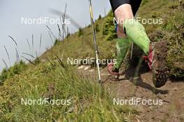 08.07.2011, Ehrwald, Austria (AUT): good shoes for the mud of the Landeck trails - Salomon 4 Trails, trail running, 32km, Imst (AUT) - Landeck (AUT). www.nordicfocus.com. © NordicFocus. Every downloaded picture is fee-liable.