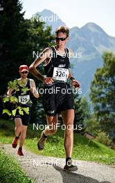 03.09.2011, Hirschegg, Kleinwalsertal, Austria (AUT): l-r: Joe Symonds (GBR), TEAM INOV-8 GORE-TEX FOOTWEAR, Jethro Lennox (GBR), TEAM INOV-8 GORE-TEX FOOTWEAR    - Gore Tex Transalpine Run, trail running, 27km, Oberstdorf (GER) - Hirschegg (AUT). www.nordicfocus.com. © NordicFocus. Every downloaded picture is fee-liable.