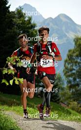 03.09.2011, Hirschegg, Kleinwalsertal, Austria (AUT): l-r: Miguel Capo Soler (ESP), TransMallorcaRun TEAM, Bernat Castaner (ESP), TransMallorcaRun TEAM    - Gore Tex Transalpine Run, trail running, 27km, Oberstdorf (GER) - Hirschegg (AUT). www.nordicfocus.com. © NordicFocus. Every downloaded picture is fee-liable.