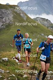 04.09.2011, Schruns, Austria (AUT): l-r: Jan Wuestenfeld (GER), Claudia Nystad (GER), ORTHOMOL SPORT TEAM LEIPZIG    - Gore Tex Transalpine Run, trail running, 53km, Hirschegg (AUT) - Schruns (AUT). www.nordicfocus.com. © NordicFocus. Every downloaded picture is fee-liable.
