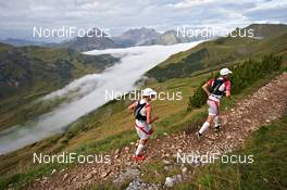 04.09.2011, Schruns, Austria (AUT): l-r: Julien Chorier (FRA), TEAM SALOMON INTERNATIONAL, Philipp Reiter (GER), TEAM SALOMON INTERNATIONAL     - Gore Tex Transalpine Run, trail running, 53km, Hirschegg (AUT) - Schruns (AUT). www.nordicfocus.com. © NordicFocus. Every downloaded picture is fee-liable.