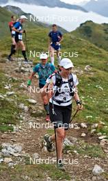 04.09.2011, Schruns, Austria (AUT): Gitti Schiebel (GER),  TEAM MOUNTAIN HEROES SALOMON    - Gore Tex Transalpine Run, trail running, 53km, Hirschegg (AUT) - Schruns (AUT). www.nordicfocus.com. © NordicFocus. Every downloaded picture is fee-liable.